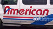 Cut Vinyl Lettering: American Coach van line fleet graphics.