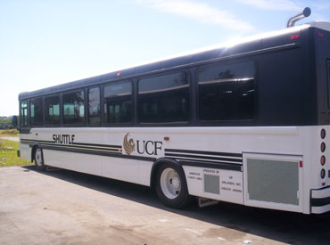 Cut Vinyl Lettering: UCF Shuttle fleet with cut vinyl lettering and graphics.