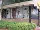 Vinyl Window Graphics: Thumbnail of Store front windows with full color  printed vinyl graphics.