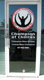 Vinyl Window Graphics: Glass door with  printed and cut vinyl window graphics.