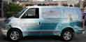 Vehicle Wraps: Ocean Magic Cargo Van Wrap.